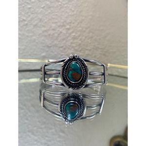 Sterling Silver Bracelet with Turqoise Centerpiece